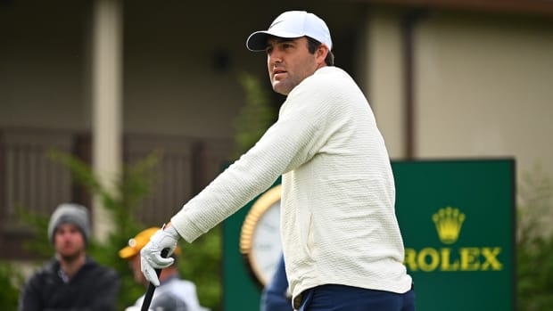 Scottie Scheffler watches his tee shot at the first hole during the third round of AT&T Pebble Beach Pro-Am at Pebble Beach Golf Links on February 3, 2024 in Pebble Beach, California. 